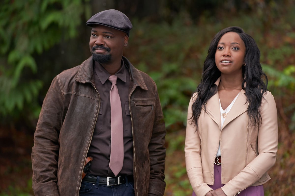 Viv Leacock, in a hat, and Natasha Burnett, in a pink jacket, in 'Legend of the Lost Locket' on Hallmark Channel