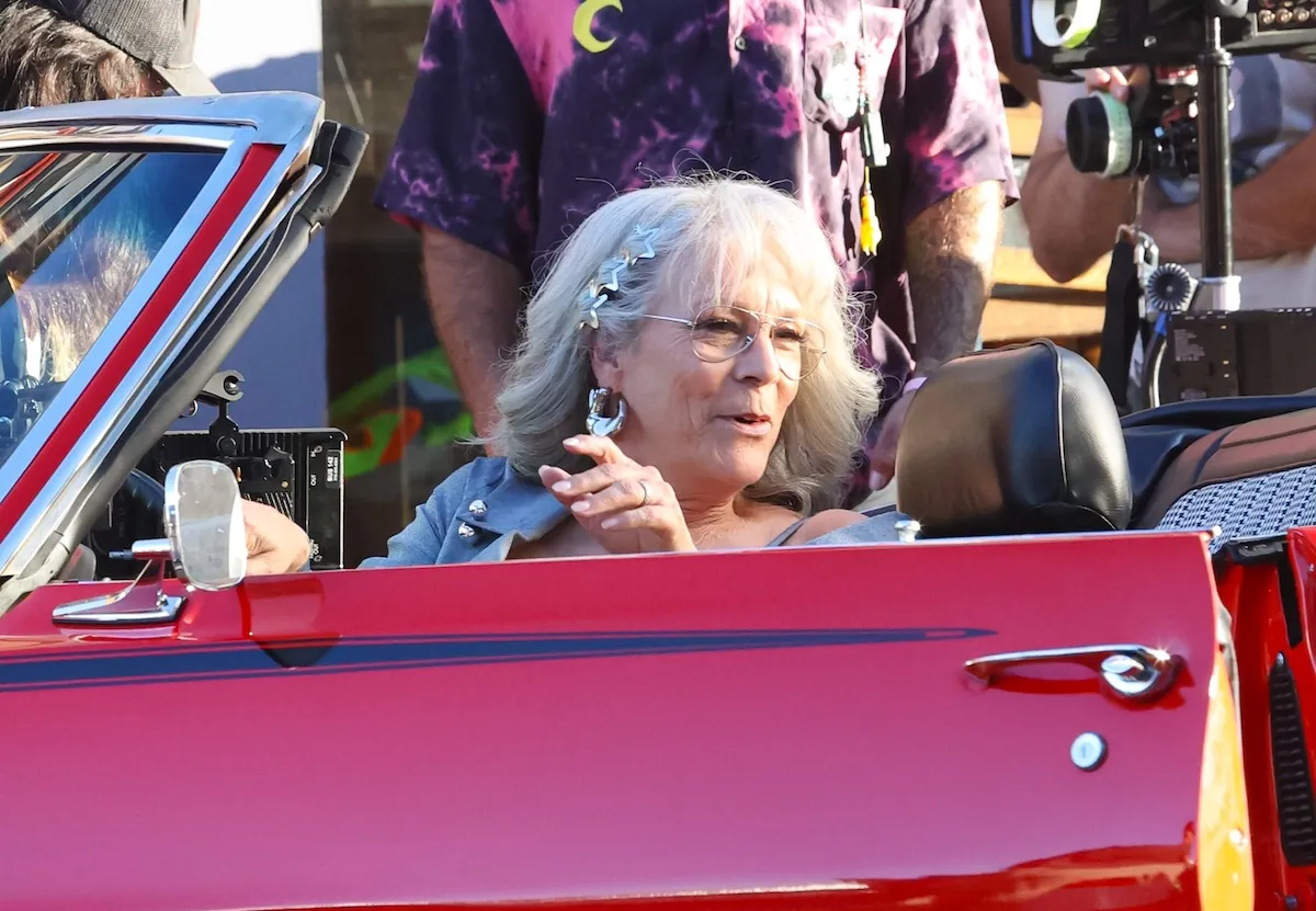 Jamie Lee Curtis in a red convertible on the set of 'Freakier Friday'