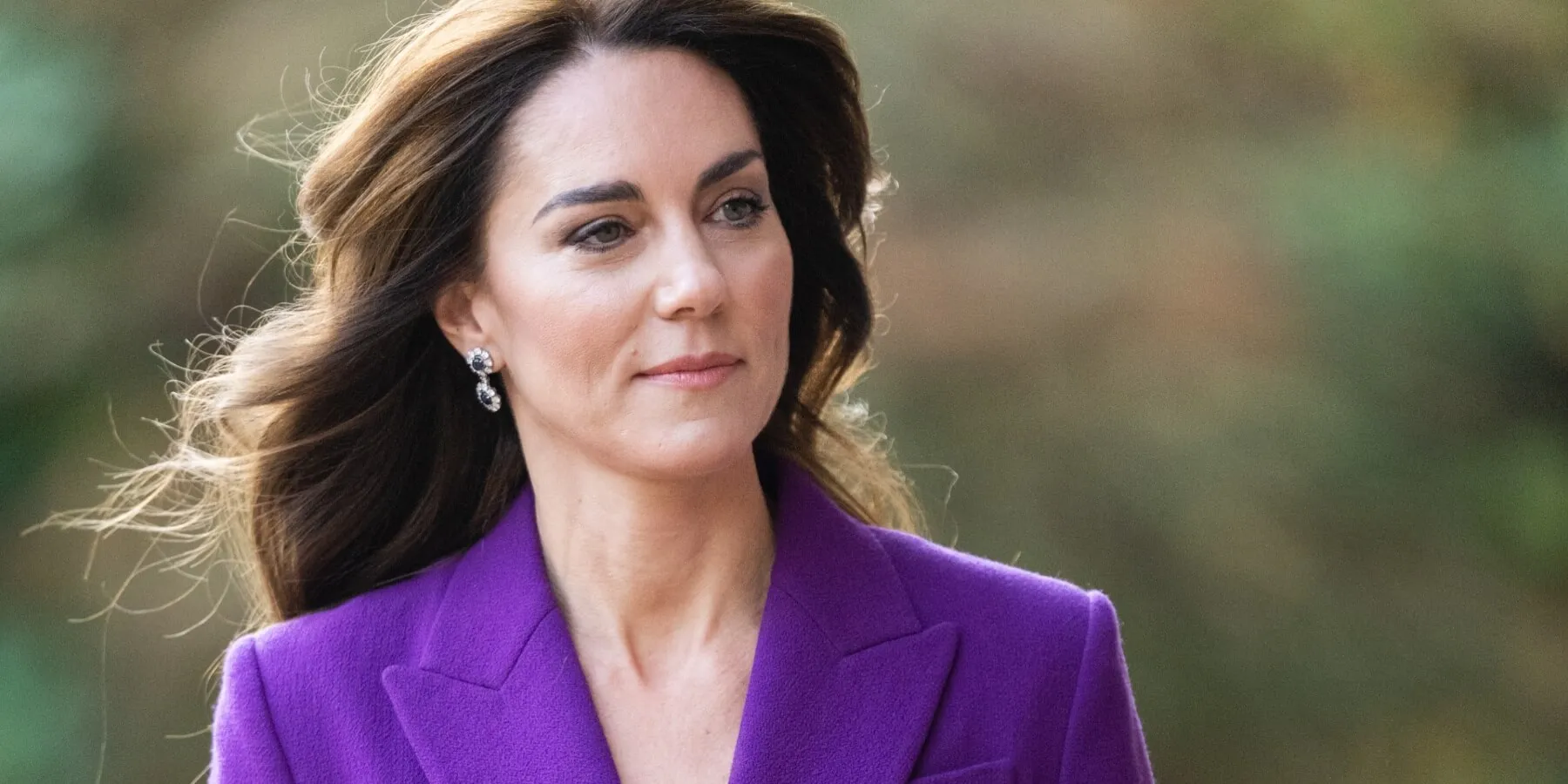 Kate Middleton in a purple suit