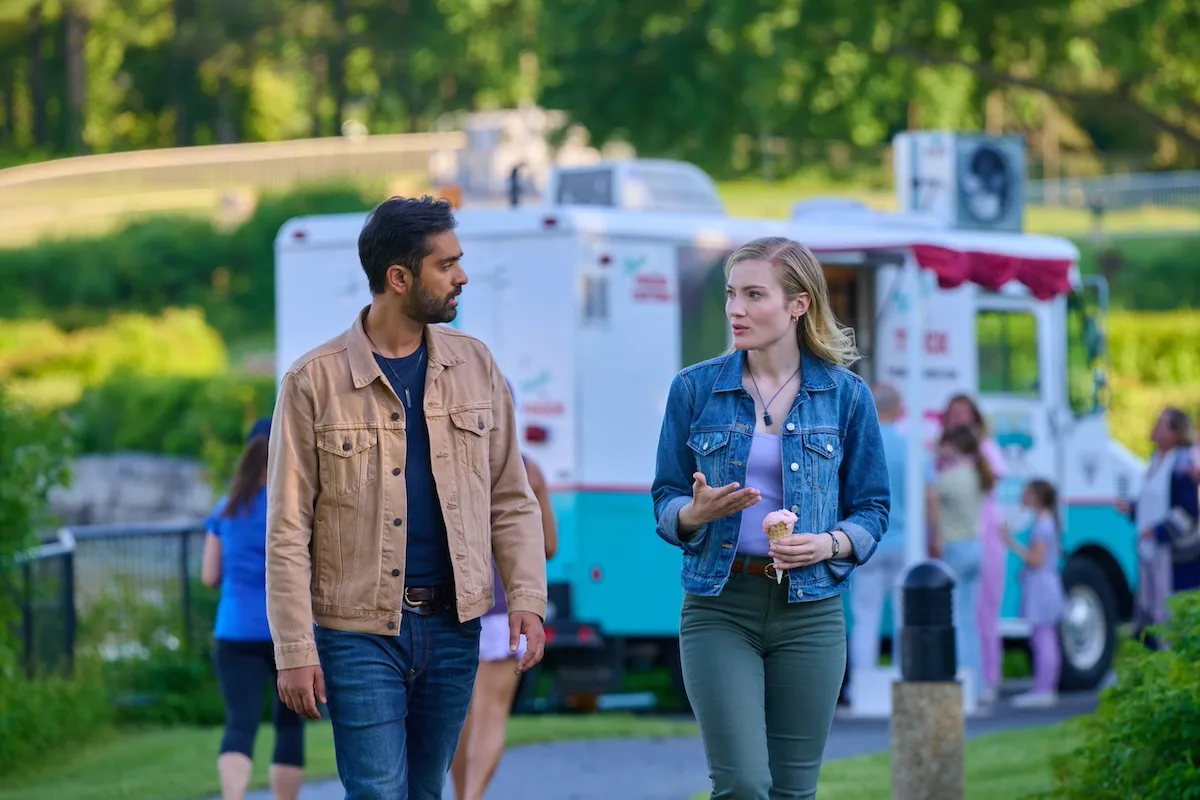 A couple walking in front of an ice cream truck in the Hallmark Movie 'My Dreams of You'