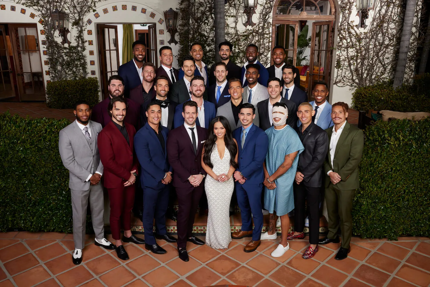 'The Bachelorette' Season 21 cast standing with Jenn Tran